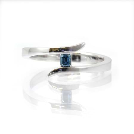 0.12 carat Fancy Deep Blue emerald cut diamond ring