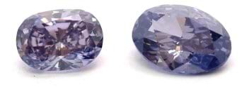 0.18 ct Fancy Dark Violet diamond and a 0.13 ct Fancy Intense Violet diamond