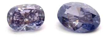 Fancy-Diamant in Dunkelviolett mit 0,18 Karat und ein Diamant in Fancy-Intensiv-Violett mit 0,13 Karat