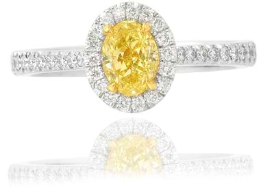 0.60 Carat, Oval Fancy Yellow Diamond Halo Ring with Pave Setting, Oval