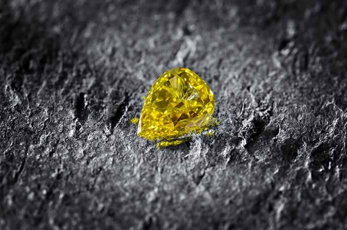 1.05 carat, Fancy Vivid Yellow Orange Diamond, Pear Shape, SI2 Clarity, GIA