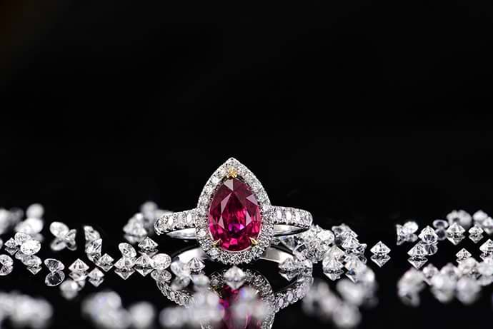 Unheated Pear Ruby and Diamond Halo Ring