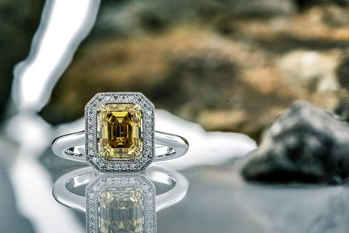 Fancy Deep Orangy Yellow Emerald Diamond Halo Ring (1.23Ct TW)