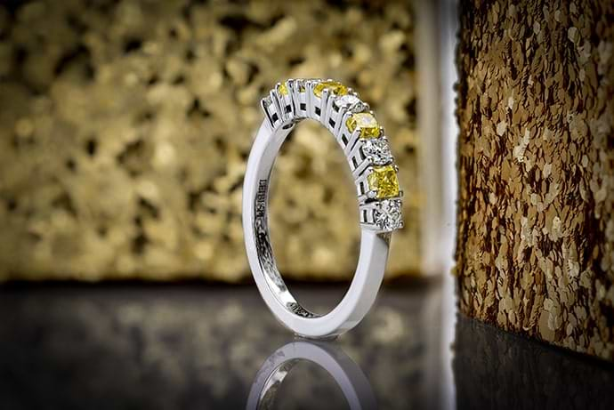 Yellow and white diamond wedding band