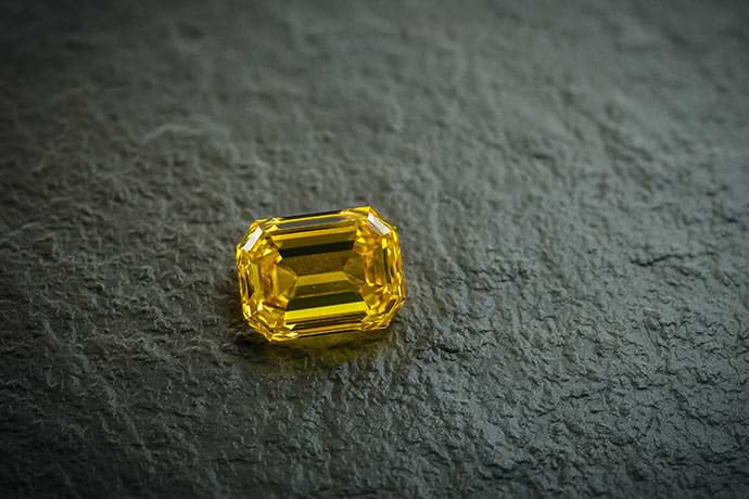 A 3.07ct fancy vivid orangy yellow diamond 