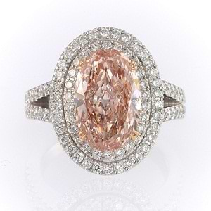 3.30ct Fancy Orangy Pink Oval ring