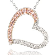 0.37 Carat, Fancy Pink Diamond and White Diamond Pave Heart Pendant
