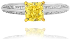 Weißgold-Ring mit Diamant im Radiant-Schliff in Fancy Intense Yellow und Pavé-Seitenstein gefasst in Gelbgold, 1,00 Karat