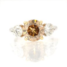 2.07 Carat, Fancy Yellowish Brown three stone diamond ring, Round, VS2