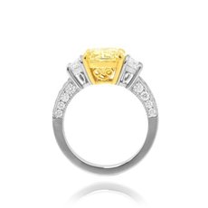 3.35 Carat, Fancy Light Yellow Radiant Diamond Engagement Ring