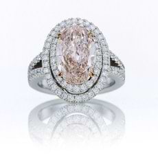 4.17 Carat Diamond Ring with a 3.30-carat Fancy Orangy Pink Diamond Oval Center Stone