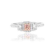Pink emerald shape Halo and Trapezoids accent engagement ring