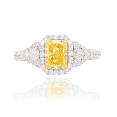 Yellow_radiant _shape_set_in_a_Halo_and_Triangle_accent_engagement_ring