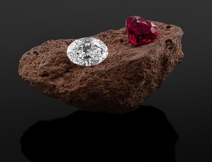 A ruby next to a colorless diamond