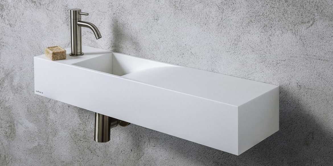 Split gesponsord rol Toiletfonteinen van Solid Surface Corian. Mat witte wastafels voor op toilet