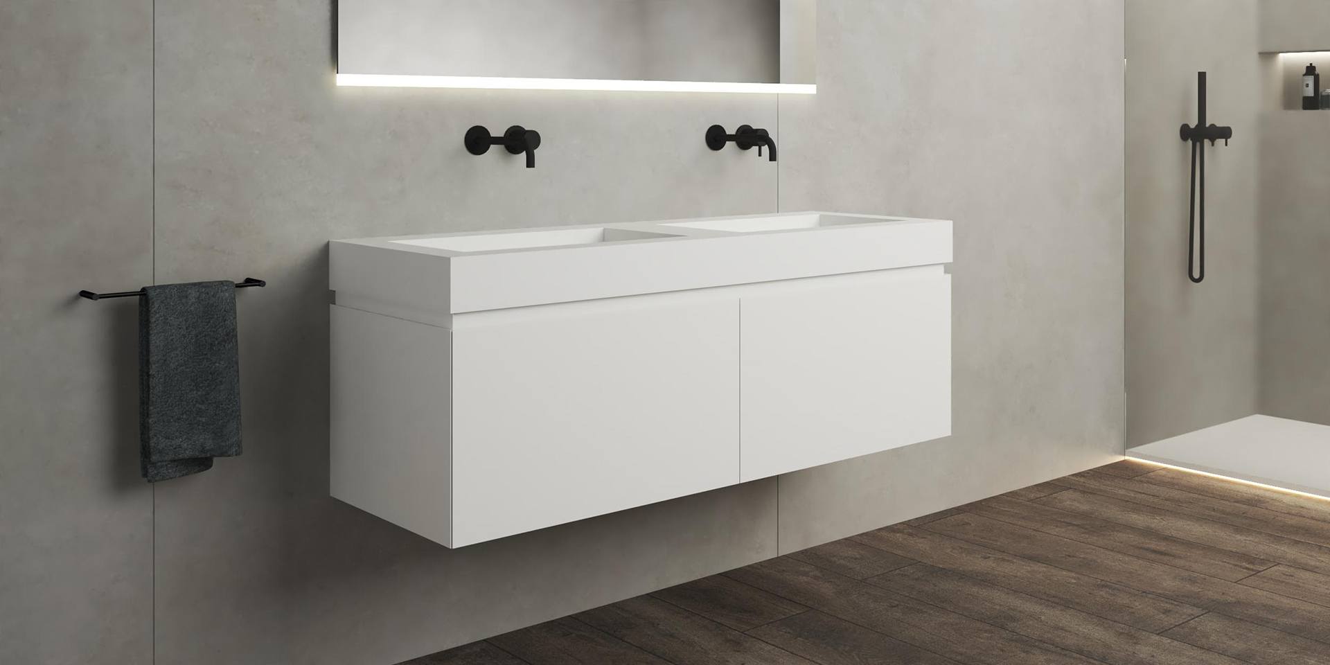 Badkamermeubel B DUTCH Sorrento. De Sorrento is vervaardigd van Solid Surface Corian. Een zeer duurzaam hoogwaardig mat wit materiaal dat zeker niet vergeelt. B DUTCH produceert badkamermeubelen op 130 cm breedte in diverse modellen, materialen en kleuren. B DUTCH produceert in haar fabriek in Cuijk een unieke design collectie badmeubelen. Diverse modellen en geheel naar wens van de klant samen te stellen.