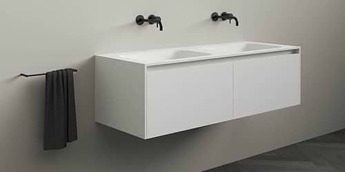 Corian badmeubel Juve Greep. Solid Surface Corian badmeubel met (dubbele) wastafel. Modern strak design B Dutch badkamermeubel van topkwaliteit Solid Surface, Corian Glacier. Dit design mat witte badmeubel is verkrijgbaar in diverse afmetingen. Badmeubel mat wit.