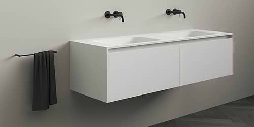 Corian badmeubel Juve Greep. Solid Surface Corian badmeubel met (dubbele) wastafel. Modern strak design B Dutch badkamermeubel van topkwaliteit Solid Surface, Corian Glacier. Dit design mat witte badmeubel is verkrijgbaar in diverse afmetingen. Badmeubel mat wit.