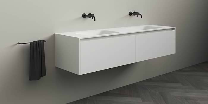 Corian badmeubel Juve Greep. Solid Surface Corian badmeubel met (dubbele) wastafel. Modern strak design B Dutch badkamermeubel van topkwaliteit Solid Surface, Corian Glacier. Dit design mat witte badmeubel is verkrijgbaar in diverse afmetingen. Badmeubel mat wit.