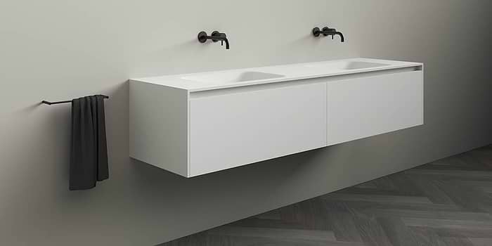 Corian badmeubel Juve Greep. Solid Surface Corian badmeubel met (dubbele) wastafel. Modern strak design B Dutch badkamermeubel van topkwaliteit Solid Surface, Corian Glacier. Dit design mat witte badmeubel is verkrijgbaar in diverse afmetingen. Badmeubel mat wit.