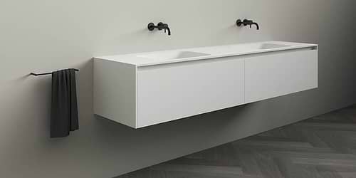 Corian badmeubel Juve Greep. Solid Surface Corian badmeubel met (dubbele) wastafel. Modern strak design B Dutch badkamermeubel van topkwaliteit Solid Surface, Corian Glacier. Dit design mat witte badmeubel is verkrijgbaar in diverse afmetingen. Badmeubel mat wit.