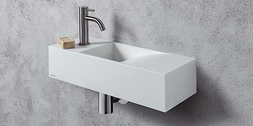 Mat witte toiletfontein 55 cm Waterfall B DUTCH. Wasbak uitsparing zit rechts van het deel waar eventueel een kraan geplaatst kan worden. Een Solid Surface Corian toiletfontein, wastafel wc, wastafeltje toilet. Toiletfonteinen uit de B DUTCH collectie Corian design toilet fonteinen. B DUTCH kent diverse series design Corian toiletfonteinen: fontein, toilet fonteintje, wc fonteintje, toilet fontein, wc fontein, wasbak toilet, wastafel toilet, wasbak wc. Topkwaliteit Corian die niet vergeelt! Ook maatwerk mogelijk.