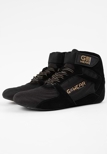 Puma high tops black and gold top