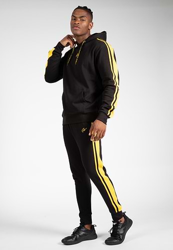 Black and yellow nike sweatpants deals