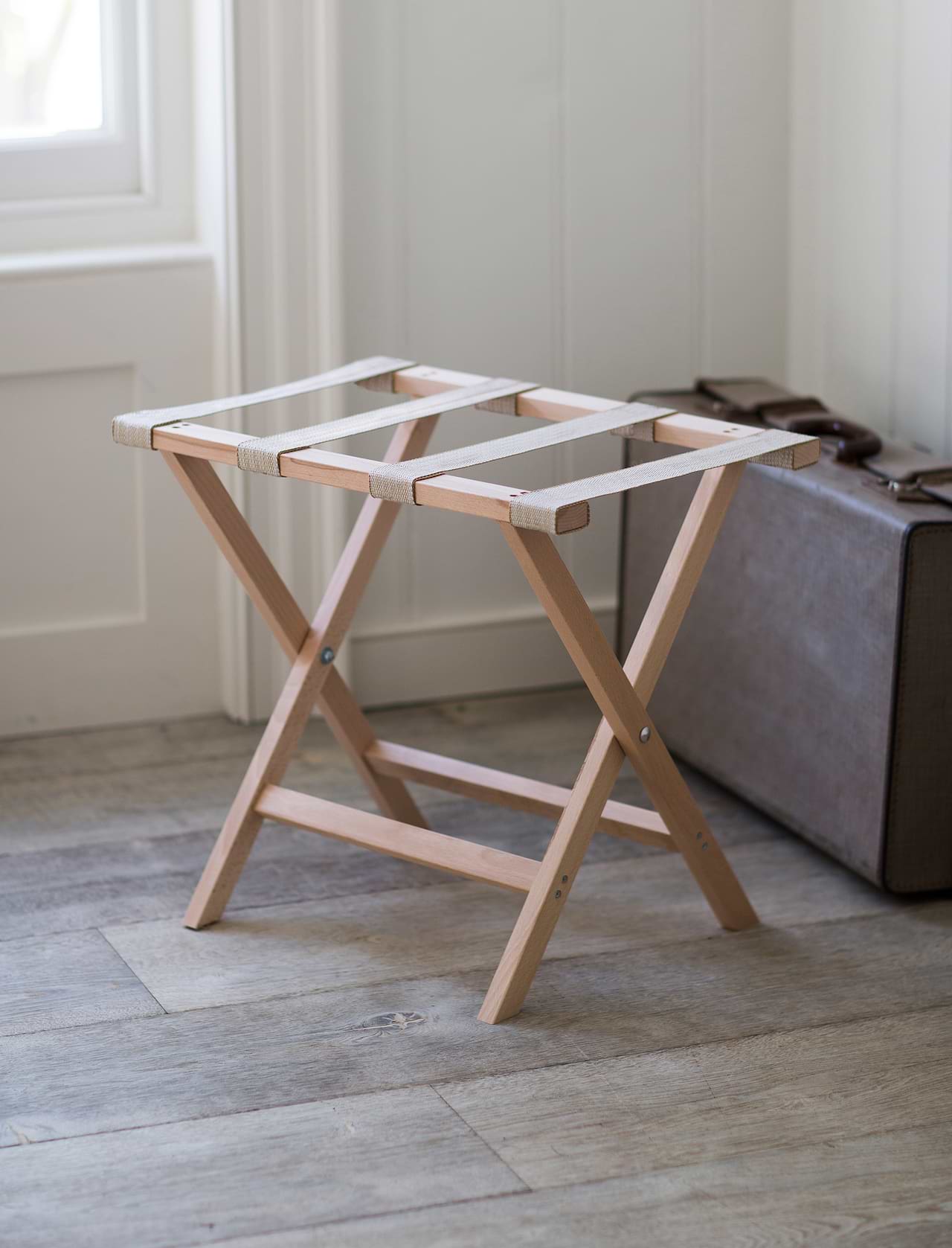 Luggage folding rack top