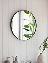 Cherington Wall Mirror - 45cm on a wooden wall