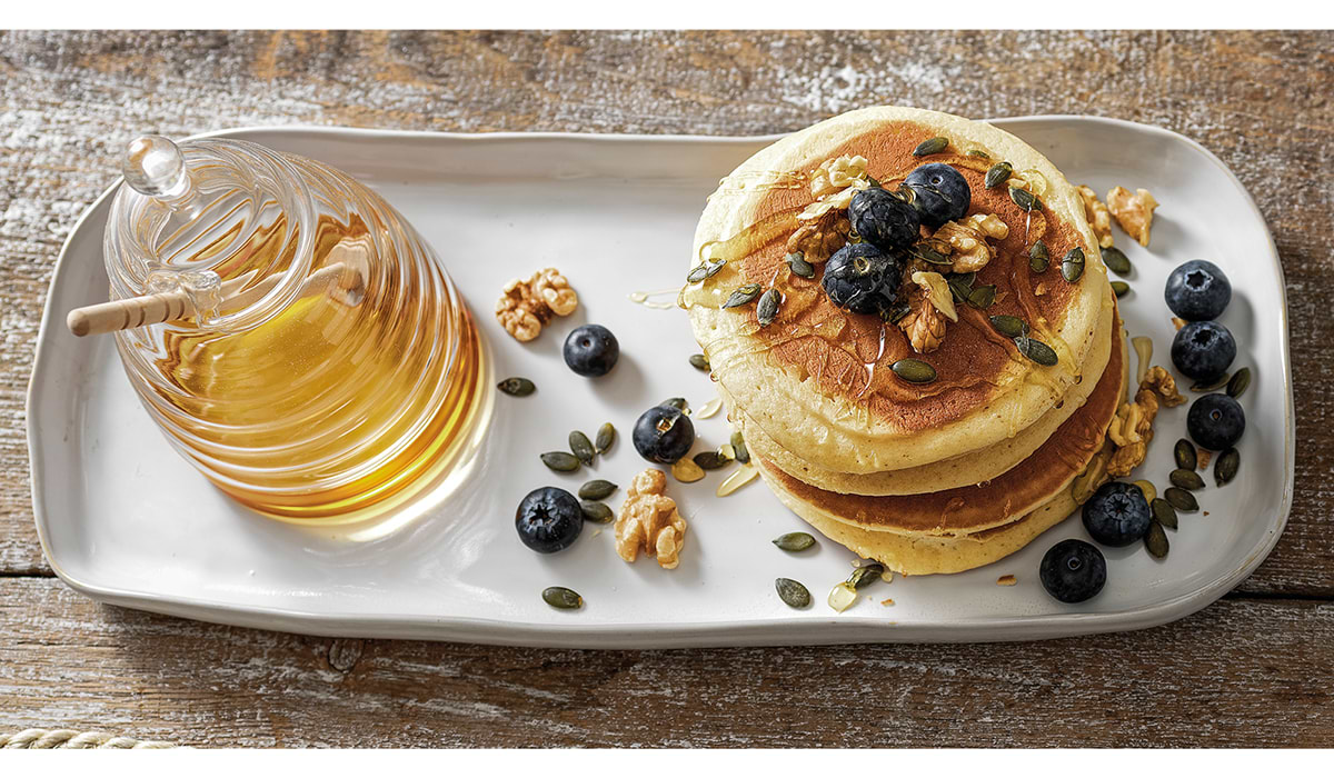 pancakes with honey and blueberries