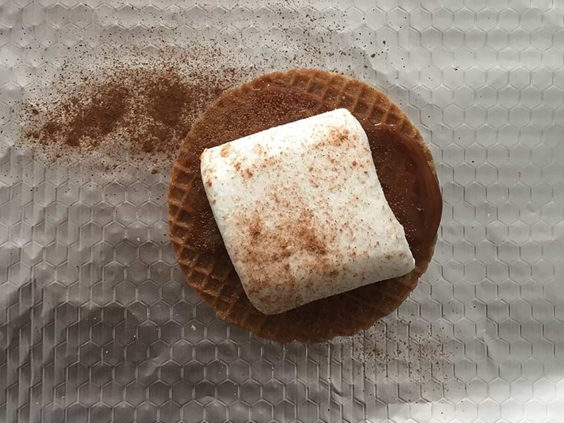 Cinnamon sprinkled on marshmallow s'more