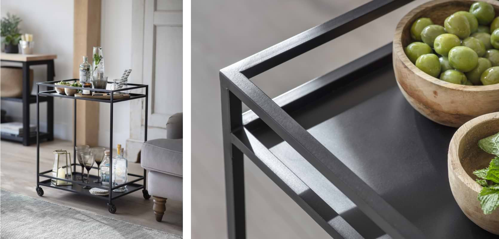 Black drinks trolley with two shelves, styled with glassware and mixers in a living space