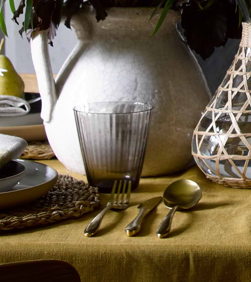 Shop the 16 piece cutlery set in brass at Garden Trading