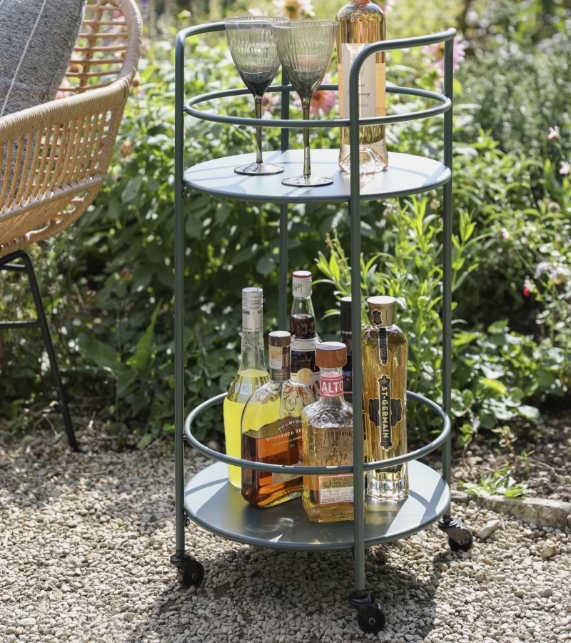 Forest Green Rive Droite Drinks Trolley with two tiers for serving drinks and showcasing alcohol collection.