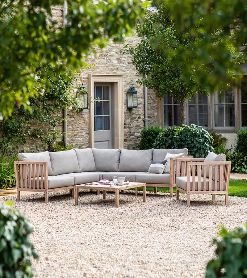 A Porthallow Coner Sofa Set in a British Garden.