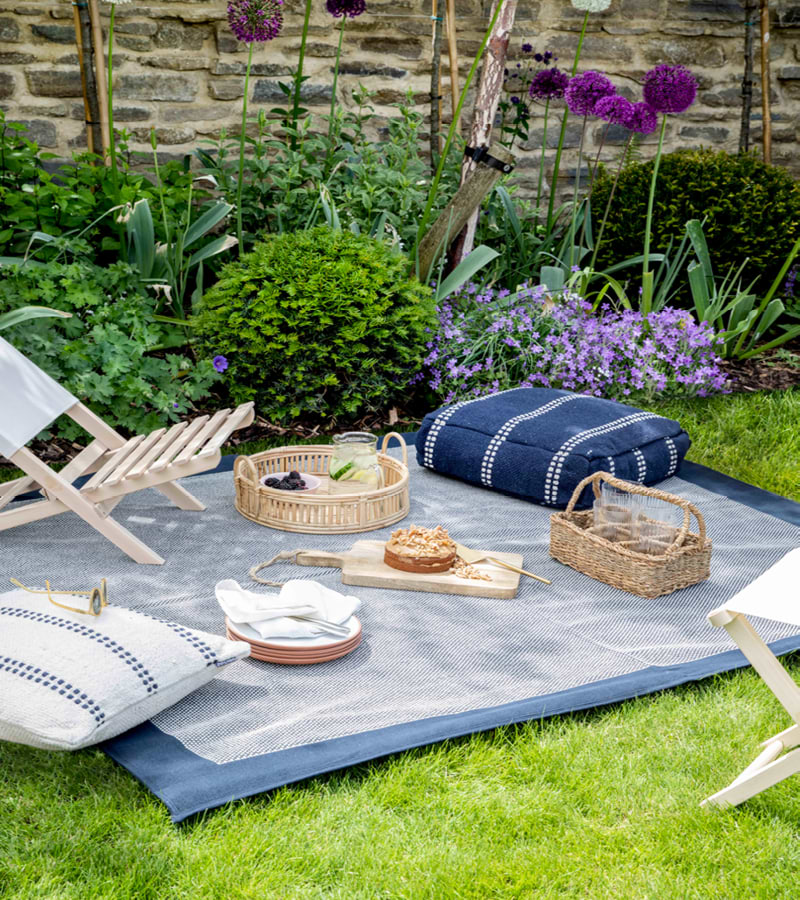 Framlingham Picnic Blanket with 2 deck chairs and a picnic