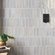 Montauk Sky 2x8 Blue Ceramic Subway Wall Tile with Mixed Finish