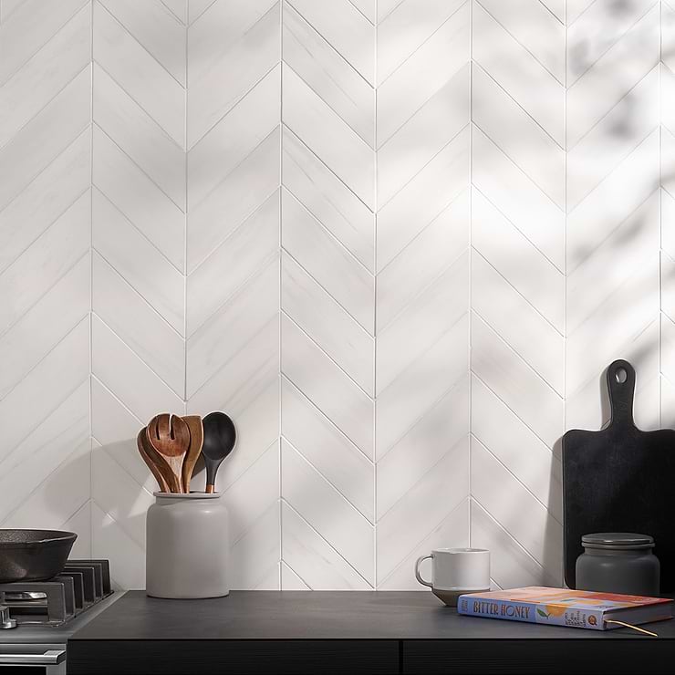 Bianco Dolomite Premium White 3x12 Chevron Honed Marble Tile; in White Marble; for Backsplash, Floor Tile, Kitchen Floor, Kitchen Wall, Wall Tile, Bathroom Floor, Bathroom Wall, Shower Wall, Shower Floor, Outdoor Floor, Outdoor Wall, Commercial Floor; in Style Ideas Art Deco, Classic, Contemporary, Traditional, Transitional; released 2023; new, trends