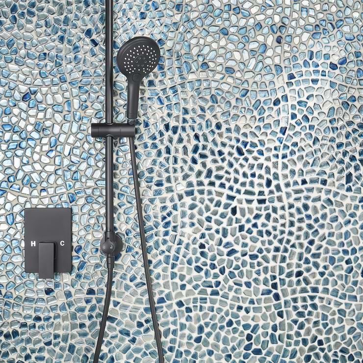 Komorebi Pebble Jet Stream Blue Polished Glass Mosaic; in Blue, Gray Glass; for Backsplash, Kitchen Wall, Wall Tile, Bathroom Wall, Shower Wall; in Style Ideas Beach, Contemporary, Mediterranean, Transitional, Tropical, Whimsical; released 2023; new, trends