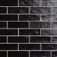 Sample-Montauk Jet 2x8 Black Ceramic Subway Wall Tile with Mixed Finish