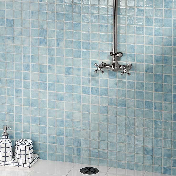 Swim Fiji Light Blue 2x2 Polished Glass Mosaic; in Blue Glass; for Backsplash, Kitchen Wall, Wall Tile, Bathroom Floor, Bathroom Wall, Shower Wall, Shower Floor, Outdoor Wall, Pool Tile; in Style Ideas Beach, Classic, Contemporary, Mediterranean, Tropical
