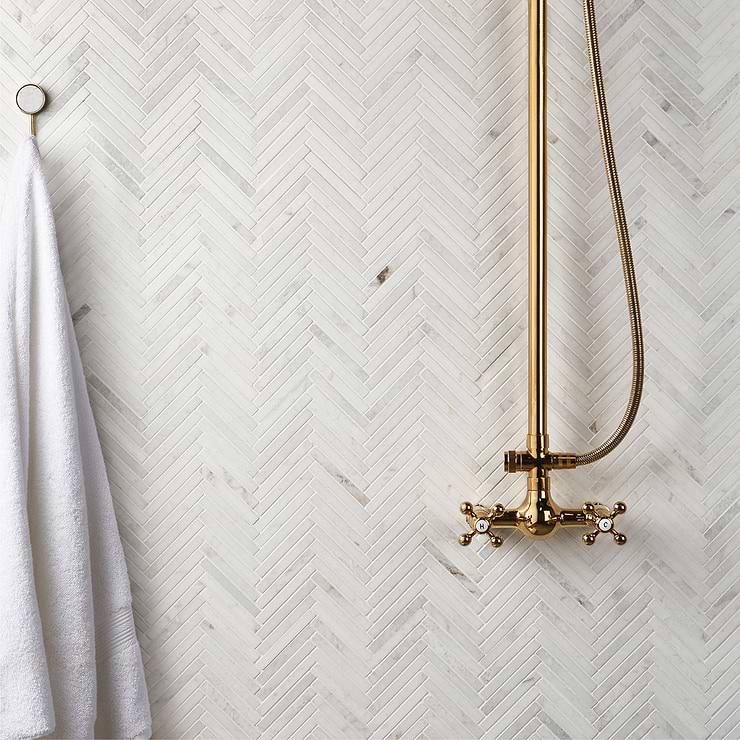 Alaska White 1/2" x 4" Herringbone Polished Marble Mosaic Tile; in White Marble; for Backsplash, Floor Tile, Kitchen Floor, Kitchen Wall, Wall Tile, Bathroom Floor, Bathroom Wall, Shower Wall, Shower Floor, Outdoor Floor, Outdoor Wall, Commercial Floor; in Style Ideas Classic, Contemporary, Mid Century, Traditional, Transitional; released 2023; new, trends