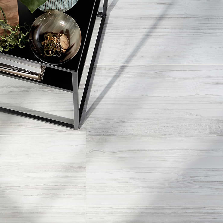 DreamStone Luminus White 12x24 Polished Porcelain Tile; in White and Gray Porcelain; for Backsplash, Floor Tile, Kitchen Floor, Kitchen Wall, Wall Tile, Bathroom Floor, Bathroom Wall, Shower Wall, Outdoor Floor, Outdoor Wall, Commercial Floor; in Style Ideas Contemporary, Modern, Traditional, Transitional