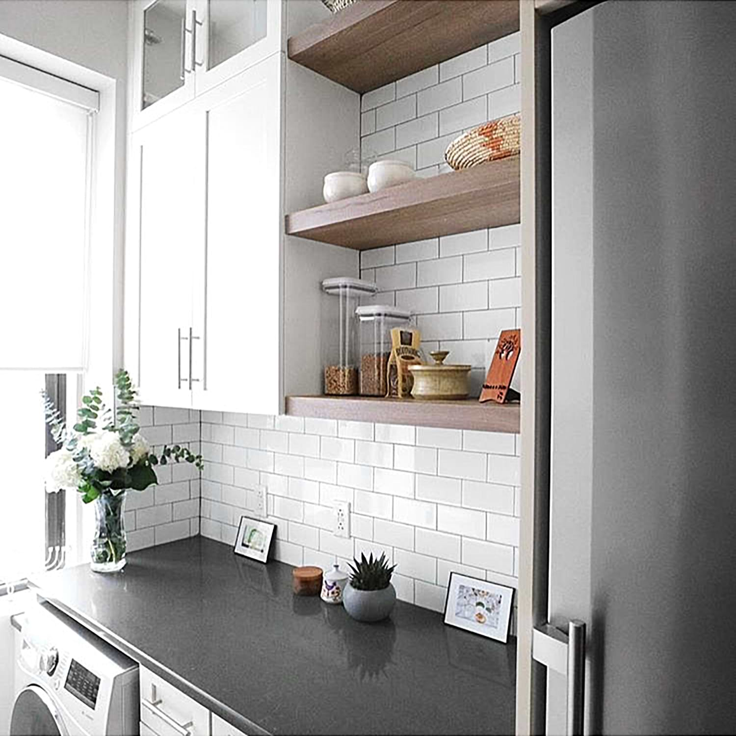 basic 3x6 white ceramic tile used in utility room