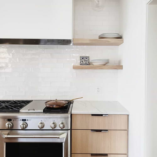 Modern Kitchen With Open Shelving Against Backsplash