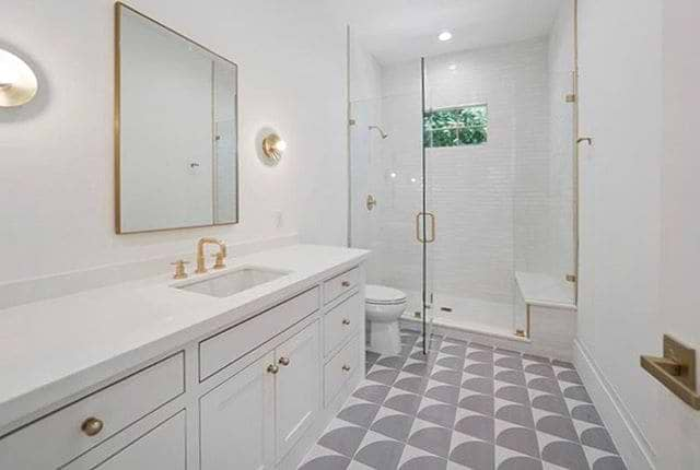 Stacy Garcia Maddox Deco Cool Gray 8x8 Matte Porcelain Tile shown as a example on the bathroom floor