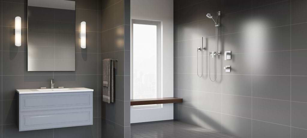 A modern bathroom with a white floating vanity and shower. 