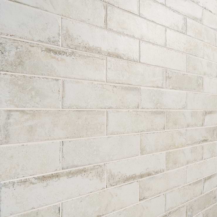 Sample-Seville Olimpia White 3x12 Travertine Look Matte Porcelain Tile