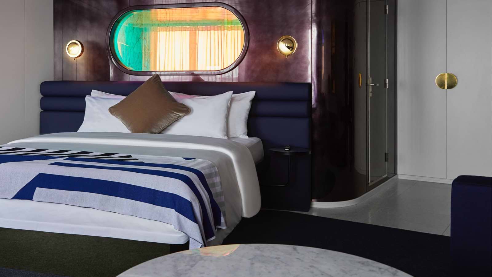 Gorgeous Suite bed and peek-a-boo shower window above